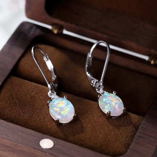 Round cut opal earrings